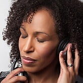 Karen Wilkins with headphones